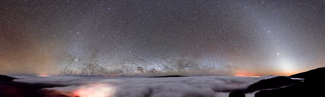 Gemini North observatory beneath a dense Milky Way and a low deck of clouds